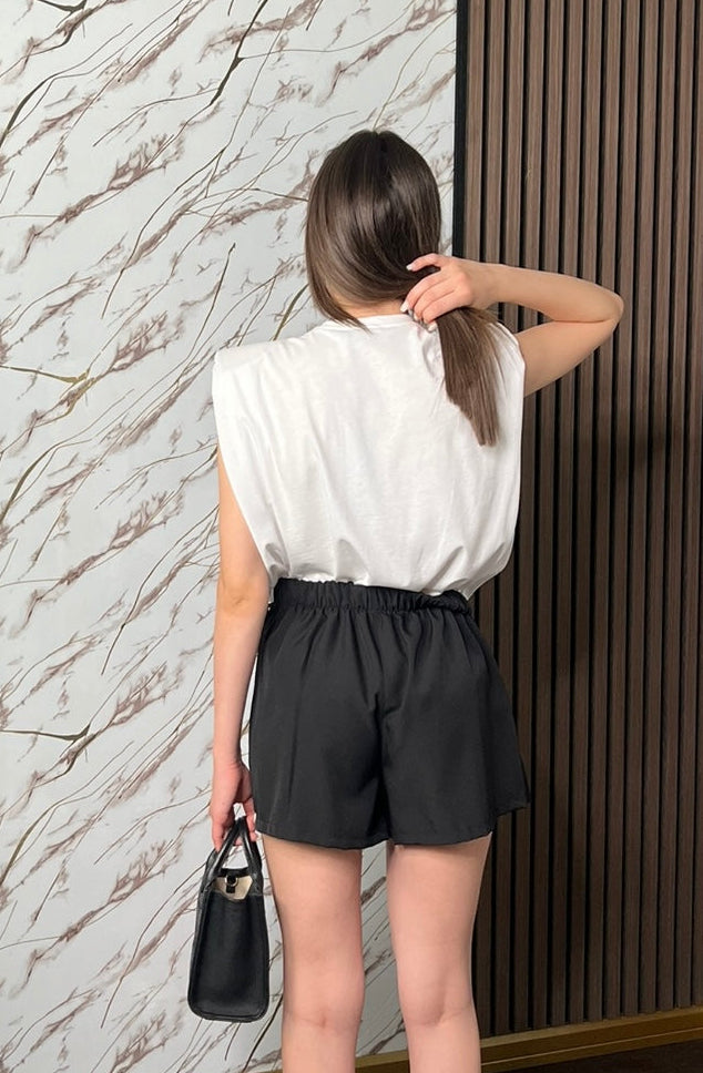 Canotta “Mantova” – Top Smanicato Bianco con Stampa Bustier Trompe-